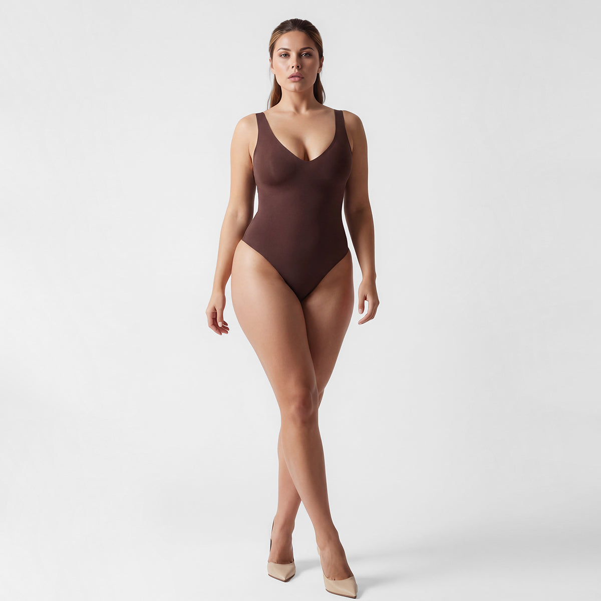 Shevee unlined plunge thong Bodysuit cocoa full body walking pose front view