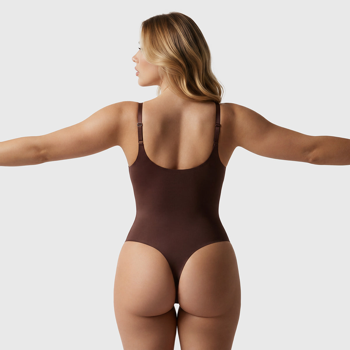 Shevee unlined plunge thong Bodysuit cocoa flat lay product minimalist design